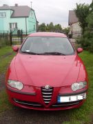 Alfa Romeo 147 1.6 l sprzedam czerwony kupiony w polskim salonie ABS ASR 8900 PLN z małym przebiegiem Częstochowa