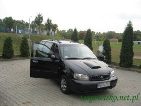 Kia Carnival 2000 r Mini Van sprzedam czarny 9550 PLN cena do negocjacji nieuszkodzony diesel 4-drzwiowy